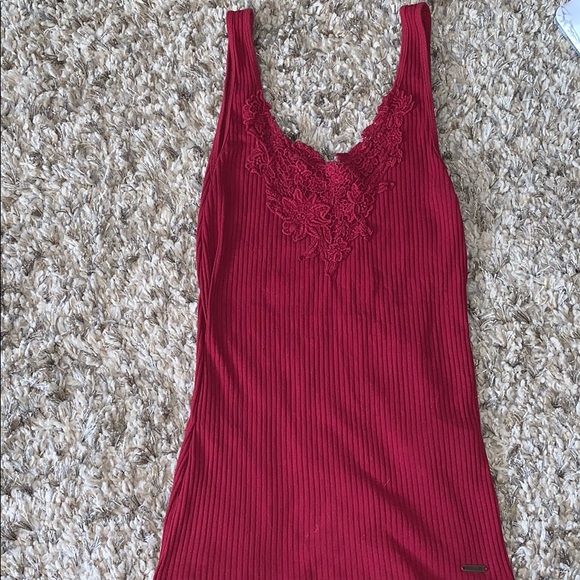 Hollister Tops - Red tank top with floral design on front